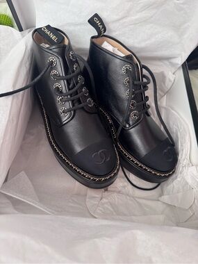 CHANEL Black Lace-Up Platform Ankle Boots with Chain Accent